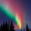 The Aurora Borealis blazes across the sky above Churchill, Manitoba.